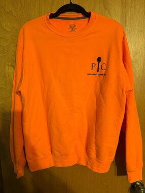 Bright Orange Crewneck Sweatshirt with Pampered Chef Chest Logo
